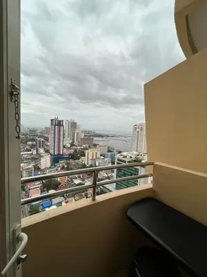 a balcony with a view of a city at Kiean Leases in Manila