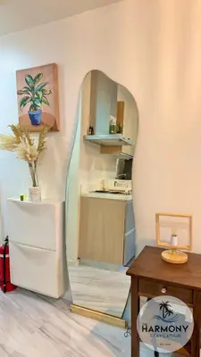 a room with a mirror and a table at Azure Residences Staycation - Bahamas tower in Manila