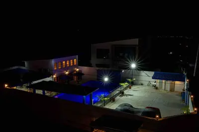 a building at night with lights in front of it at Private Resort in upper Antipolo in Antipolo