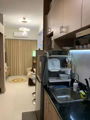 a kitchen with a sink and a counter top at PEACETIME CONDO FIELD RESIDENCES BLDG 6 u1006B in Manila