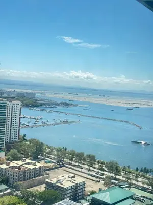 an aerial view of a large body of water at Malate Bayview Mansion Korean Town 1Bedroom in Manila