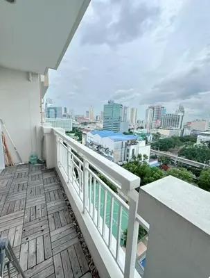 a balcony with a view of the city at Torre de manila taft 23 in Manila