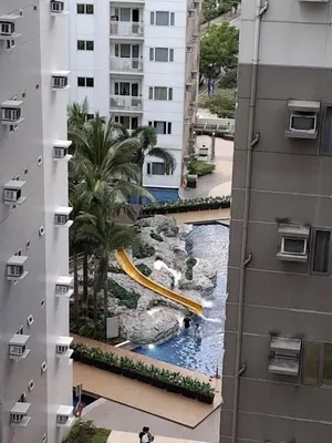 a view of a water park from a building at Staycation Modern & Convenient in Tubigan