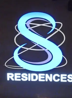 a sign with the logo of the los angeles chargers at Condotel at S Residences near SM MOA, SMX, Arena, NAIA Airport in Manila