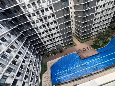 an aerial view of two apartment buildings and a swimming pool at Unistay SHORE 3 Tower 2 Pool View Cozy Suite in Manila