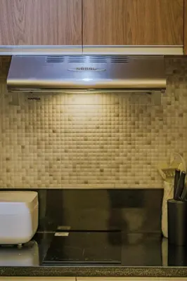 a close up of a microwave in a kitchen at EC Suites Modern 1Br Suite w Balcony in Pasay in Manila