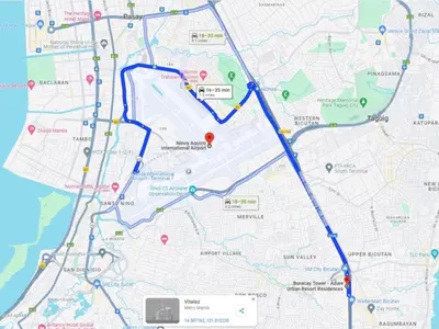 a map with blue and red roads and buildings at Premium 1Bedroom Condo Unit Near Airport, MOA, Casinos, SM Bicutan in Manila