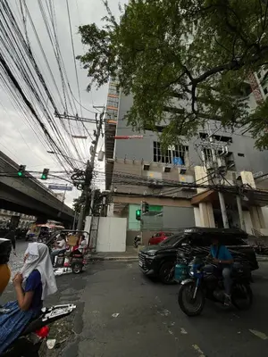 a group of people riding motorcycles on a street at Lil Max Staycation in Manila