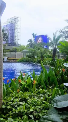 a view of a pool in a resort at Millionaire Makati Brio Tower in Manila