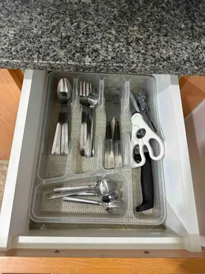 a plastic tray with utensils in a drawer at Studio in Araneta City Fast Wifi Great Location in QC in Manila
