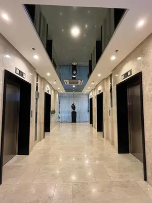 a hallway of a building with elevators in it at Hotel like Condo at Pasay in Manila