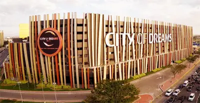 a building with a sign on the side of it at Mall of Asia - SMDC Shore in Manila