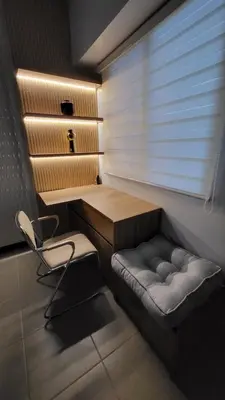 a desk and chair in a room with a window at The Atherton- Spacious Modern Condo Unit in Paranaque Near the Airport, Makati, BGC and Highways in Manila