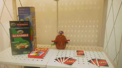 a toy sitting on a shelf next to some food at 1BR Room-Stunning MOA view FIREWORKS in Manila