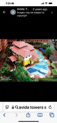 a screenshot of a website with a picture of a resort at Avida sm sucat condotel in Manila