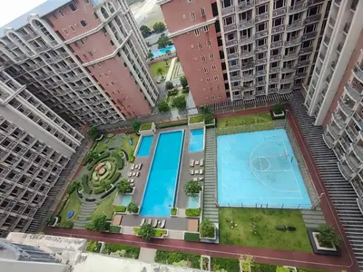 an overhead view of a building with a swimming pool at Pool View BP1043 in Manila