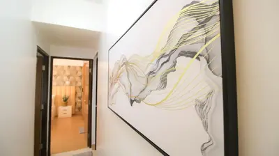 a painting of a horse on a wall in a hallway at CYLOS PLACE Manhattan Araneta Center 2BR with BALCONY in Manila