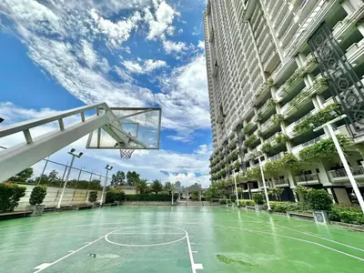 a basketball court in a building with a basketball hoop at Scenic place to stay in manila 3618 in Manila