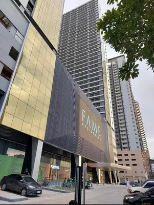 a car parked in front of a large building at Condo Staycation Fame Residences T2 Mandaluyong Philippines in Manila
