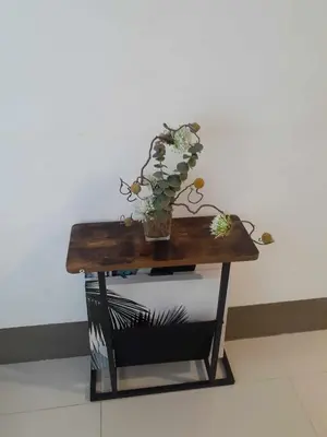 a table with a potted plant on top of it at Condo Staycation Fame Residences T2 Mandaluyong Philippines in Manila
