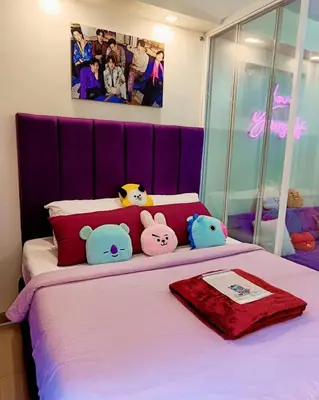 a bed with hello kitty stuffed animals on it at BTS CRIB at MOA PASAY CITY in Manila