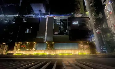 an overhead view of a building at night at JCS Place in Manila