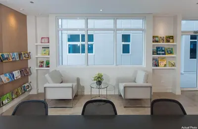 a living room with a table and chairs and a window at The Linear Makati Free Wifi & Netflix LM1 in Manila