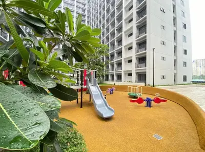 a playground with a slide in a building at SB1054 House in Manila