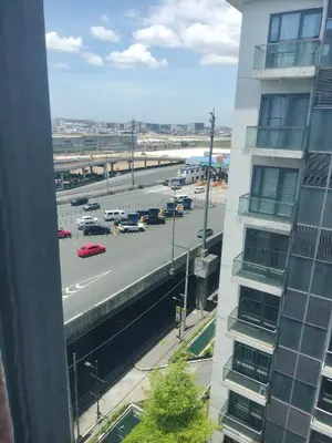 a view of a city street with a highway at 1 Bedroom Near Airport Pasay City in Manila