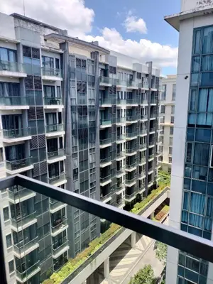 a view from the balcony of an apartment building at 1 Bedroom Near Airport Pasay City in Manila