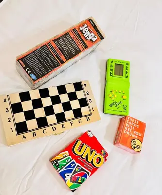 a group of childrens toys on a bed at Hearth of Ember 4 at Shore 3 Res in Manila