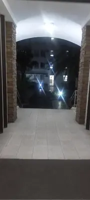 an empty room with lights in a building at Florida sun condo in Dasmariñas