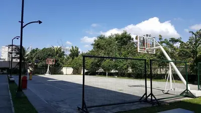 a basketball hoop on a tennis court at Compact Urban Studio-Type Unit in Manila