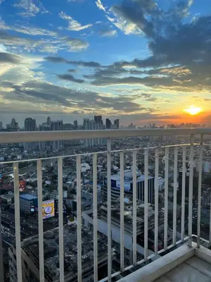 a view of the city from the balcony of a building at Studio Units at SM Light Residences Condo Beside Boni MRT Station in Manila