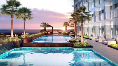 an image of a swimming pool at a hotel at Cozy Modern Sunset View in Manila