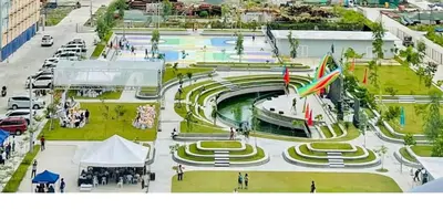 an aerial view of a water park with a roller coaster at E&L Family Suite in Manila