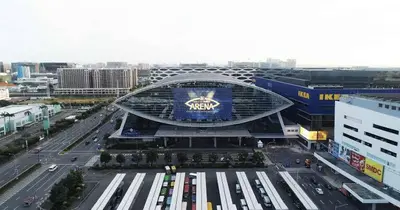 a view of a stadium with cars in a parking lot at 2br Beach KTV Condo in MOA SMX Okada, Near Airport in Manila