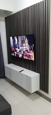 a flat screen tv sitting on top of a white entertainment center at Shore 2 Residence Staycation 1 in Manila