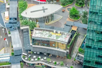 an overhead view of a building in a city at Premium 2 Bedroom and 1 Living Room Suite with Balcony - One Uptown, BGC in Manila