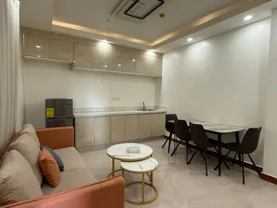 a living room with a couch and a table at JCAL Building Next to Manila Aiports Okada, Solaire MOA in Manila