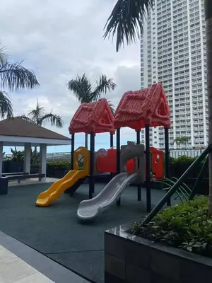 a playground with a slide at FX Property 3926 in Manila