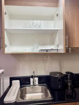 a kitchen with a sink and a counter top at Casa Aotea in Sampong