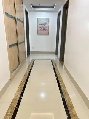 a corridor in a building with a tile floor at R&R Empire Rental Unit in Manila