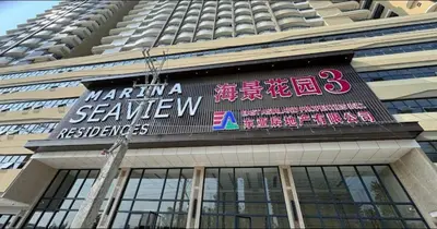 a sign on the side of a building at Sybaysuites staycation near Okada COD MOA NAIA airport Solaire MSV1808H in Manila