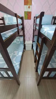 a room with two bunk beds in a room at AZURE BICUTAN MAUI G14 TOWER POOL View in Manila