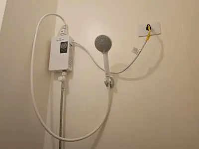 a hair dryer is hooked up to a wall at Entire Studio Unit Classio De Condotel at Urban Deca Cubao in Manila