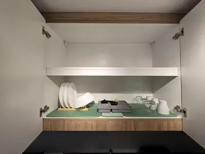 a shelf in a kitchen with some items on it at 1BR Condotel with Balcony at SM Light Residences #LT07-1 in Manila
