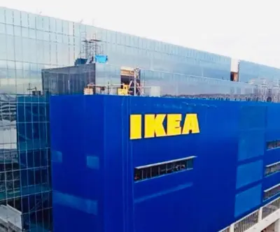 a kera building with a yellow sign on it at Mall of Asia Condohotel located in Shore Residences Pasay in Manila