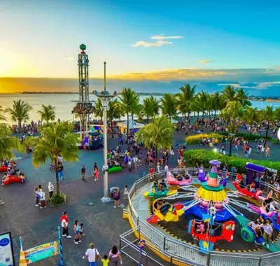 an aerial view of a carnival at a park at Apartment in Pasay, close to Mall Of Asia in Manila