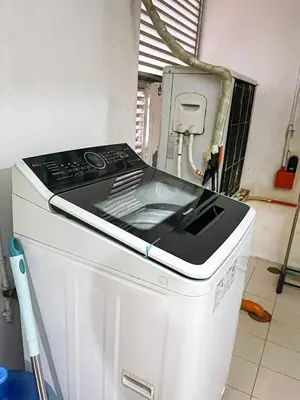 a stove top oven sitting in a kitchen at Elegant 2BR Manila Bay Sunset near US Embassy in Manila